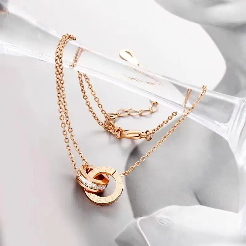 18K Golden Plated Double-Ring Snake Chain Bracelet with Rhinestone Detail – Elegant Women's Jewelry
