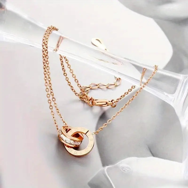 18K Golden Plated Double-Ring Snake Chain Bracelet with Rhinestone Detail – Elegant Women's Jewelry