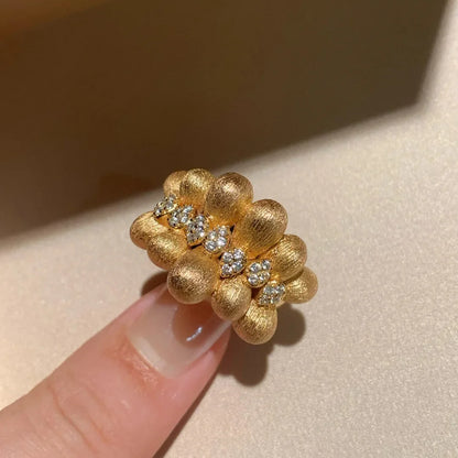 Gold Ribbon Adjustable Ring – Elegant Statement Jewelry