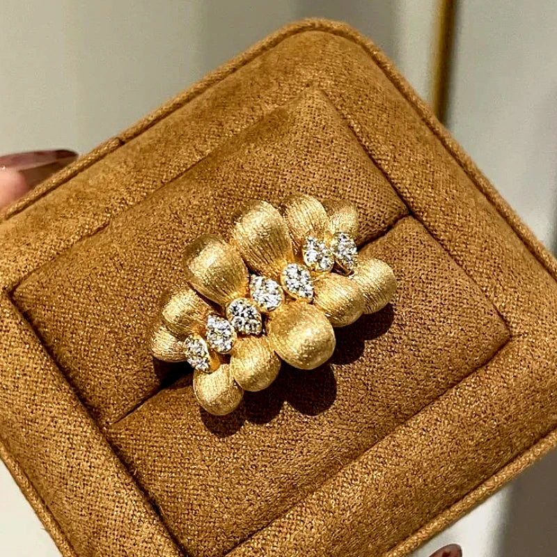 Gold Ribbon Adjustable Ring – Elegant Statement Jewelry