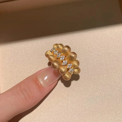 Gold Ribbon Adjustable Ring – Elegant Statement Jewelry